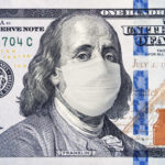 $100 bill with Benjamin Franklin wearing a face mask